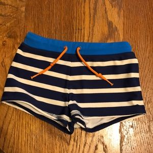 Baby Boden swim trunks